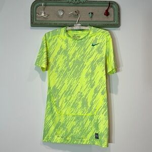 Nike pro combat compression shirt, large women’s neon yellow blue